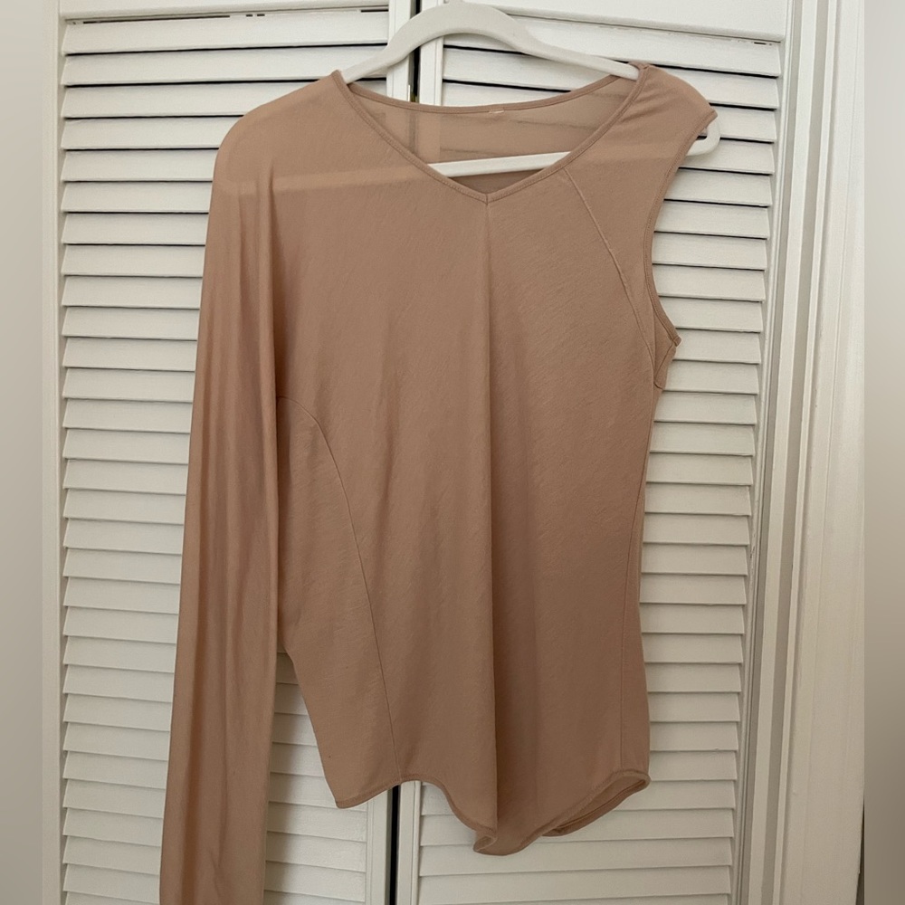 Soft comfortable one shoulder tan top.